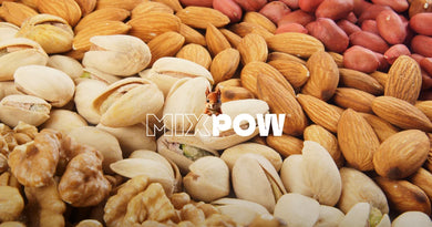 Pistaches, amandes, cacahuètes et cerneaux de noix — portions maîtrisées face au plateau de perte de poids