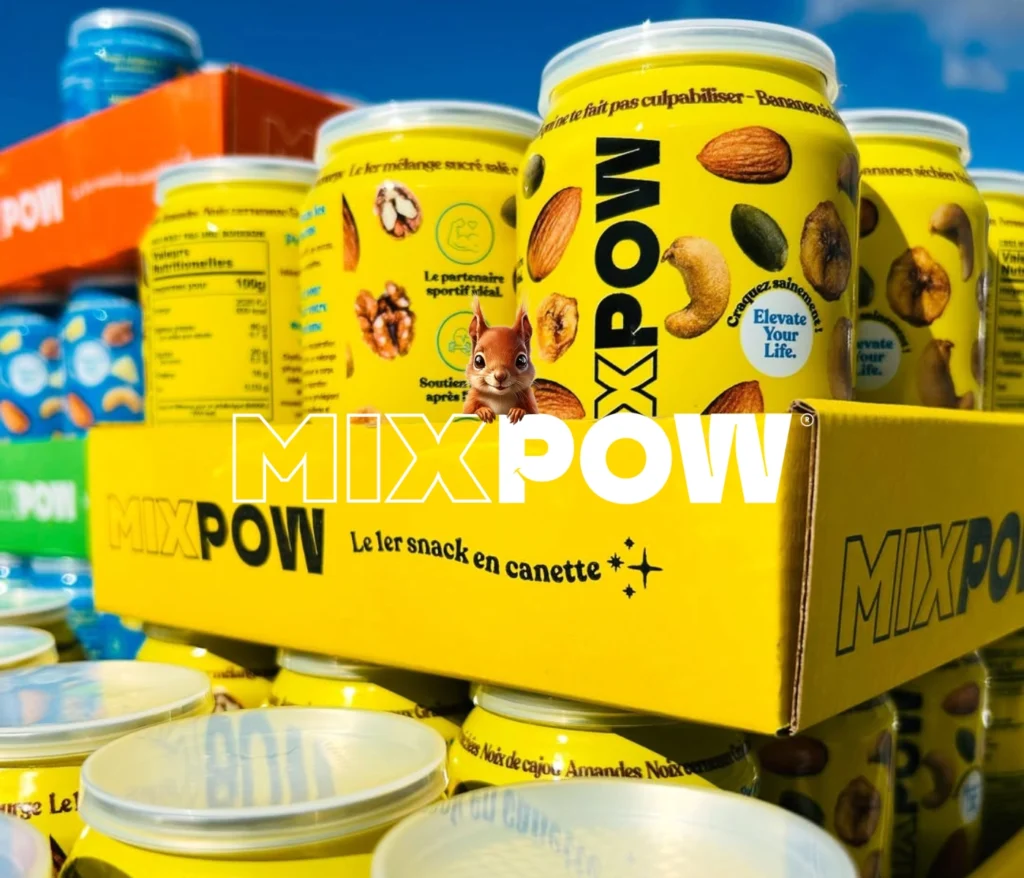 Canettes Mixpow jaunes contenant un mélange de fruits à coque et fruits secs, collation équilibrée, pratique et saine pour l’énergie au quotidien.